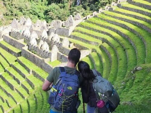 Traveleres exploring Cusco and Sacred Valley with traditional Andean culture and historic sites