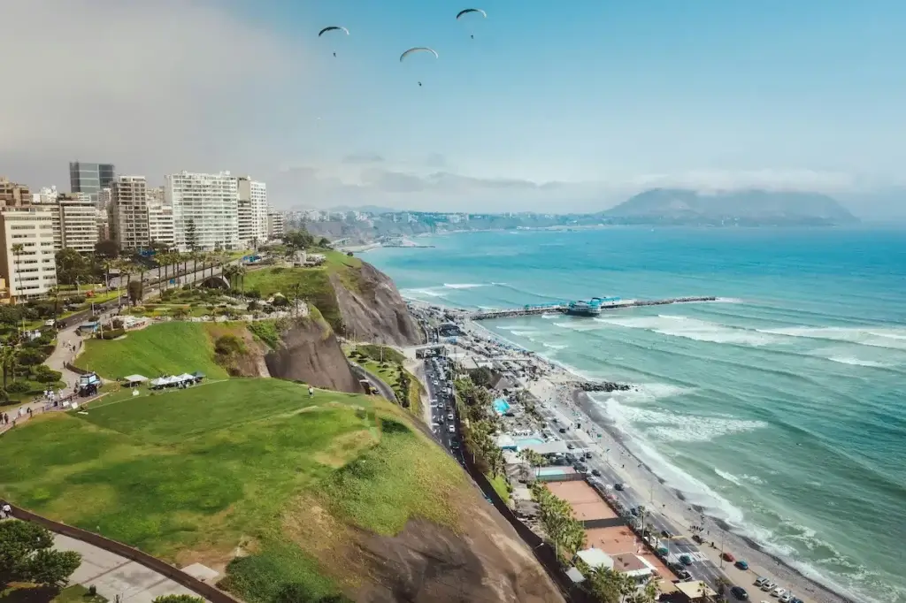 Beautiful coastal view of Lima Peru with ocean cliffs, city skyline and Pacific landscapes during a guided tour
